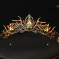 Gothic vintage gold antler crown headband with red crystals and skull detail for Halloween. - Antique Red