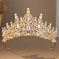 Close-up detail of luxury gold bridal tiara sparkling with iridescent rhinestones for wedding. - Gold AB