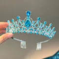 Close-up detail of blue rhinestone bridal tiara crown with hair combs for wedding and party hair. - Silver with Blue Rhinestone