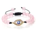 Magnifique bracelet en perles de cristal rose avec pendentif mauvais œil doré réglable. - Quartz Rose-Or