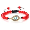 Bracelet perles rouges avec charm œil grec doré et cordon noir réglable pour femmes. - Agate Rouge (Mauvais Oeil Doré)