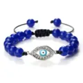 Bracelet de perles mauvais œil avec perles rondes bleues et charm en argent scintillant. - Lapis-lazuli (Mauvais Oeil Argenté)