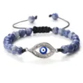 Bracelet de perles en pierre bleue avec charm œil turc en zircon et cordon réglable. - Pierre à Point Bleu Argent