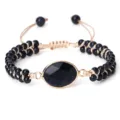 Bracelet tressé réglable en grès bleu avec pierre ovale, design élégant et unisexe. - Forme Ovale Goldstone Bleu