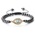 Bracelet de perles en hématite noire avec pendentif œil maléfique strass brillant. - Hématite (Mauvais Oeil Doré)