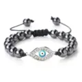 Bracelet de perles mauvais œil avec des perles rondes en hématite noire et des strass en cristal. - Hématite (Mauvais Oeil Argenté)