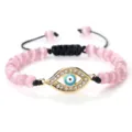 Bracelet de perles roses avec pendentif œil maléfique doré et cordon noir réglable. - Oeil de Chat Rose (Mauvais Oeil Doré)