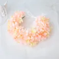 Close-up detail of the pink artificial hydrangea floral wreath with delicate white ribbon ties. - Pink Wreath / Pink