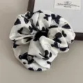 Silk satin butterfly print scrunchie, elegant black and white hair tie accessory for daily style. - Butterfly Print Hair Scrunchie / White