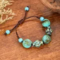 Bohemian vintage handmade beaded bracelet detail shot, retro ethnic style braided cord jewelry. - Striped Bead Style (B23-306)