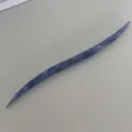 Blue marbled acetate hair stick detailed shot, elegant curved hair pin for chic bun styling. - Iridescent Blue Purple