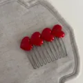 Red heart hair comb clip, sweet style metal side comb hair accessories detail shot. - Red