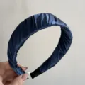 Detail view of the dark blue pleated fabric headband showcasing fine texture and retro style. - Pleated Wide Headband - Dark Blue