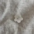 Mini jelly flower hair claw clip detail shot with sparkling rhinestone center, clear style. - Milky White