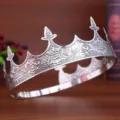 Detailed view of vintage silver men crown tiara, classic court style performance hair accessory. - Antique Silver
