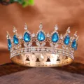Exquisite full circle alloy crown tiara featuring blue teardrop gems and rhinestones for brides. - Lake Blue
