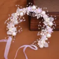 Handcrafted pearl flower bridal headband for wedding party hair styling and elegant photo shoots. - Pink Headband