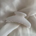 Elegant milky white hair claw clip made of premium acrylic for stylish daily hairstyles and looks. - Transparent White