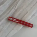 Detailed shot of red white plaid hair clip with crystal heart and lar mood text style. - Heart Rhinestone Barrette / Red Plaid