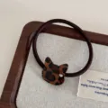 Elegant leopard print cat hair tie with rhinestone detail, cute acetate hair accessory for women. - Dark Small Cat Hair Tie / Leopard Print