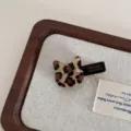 Close-up of cute leopard print cat acetate duckbill hair clip with sparkling rhinestone accent. - Light Small Cat Hair Claw Clip / Leopard Print