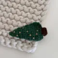 Detailed shot of cute crochet Christmas tree hair clip, handmade wool fabric side clip. - Christmas Tree - Dots