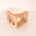 Wooden hollow aromatherapy oil burner detail showing the elegant clover cutout design. - Four-Leaf Clover