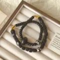 Bracelet de Perles en Bois Double Style Vintage Chinois Raffiné en Santal Tendance - Style Anneau de Course Perle Bois Noir
