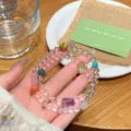 Detailed close-up of a double-layer multi-gemstone crystal bracelet with colorful beads. - Mixed Gemstones Style (81662)