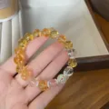 New Chinese style citrine crystal glass beaded bracelet with lotus charm, ethnic jewelry. - Painted Oil Copper Hollow Bead Style