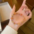 Close-up detail of the Chinese style agate and crystal beaded bracelet showing exquisite charm. - Heshang Bead Style