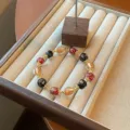 Elegant Chinese style beaded crystal bracelet with colorful glass beads and gold spacers. - Incense Ash Glaze Style (2) / Colorful