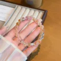 Exquisite sweet style sugar heart agate beaded bracelet detail close up showing fine texture. - Pearl Interlocking Style