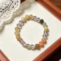 Close-up detail of multi-color rutilated quartz bracelet, showing natural gemstone beads. - Double Silver Wreath Accent Style