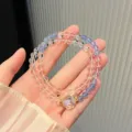 Stunning multi-color crystal beaded bracelet featuring double strands and clear details. - Aquamarine Double Strand Style