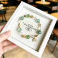 Light luxury green crystal bead bracelet with clover spacers and delicate leaf pendant. - Green Fluorite Style