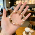 Detailed close-up of sweet pearl crystal beaded bracelet worn on hand, elegant stylish jewelry. - 1 Artificial Pearl Style