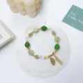 Retro sweet green bead bracelet with sparkling leaf pendant and delicate tassel, elegant jewelry. - Green