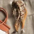 Handmade vintage paisley print linen feel small square scarf with elegant tassels for women styling. - Potala Paisley Rice Yellow