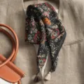 Black paisley print square scarf with tassel detail, elegant neckerchief for women styling. - Colorful Paisley Black