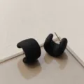 Close-up detail shot of matte black chunky C-shaped hoop earrings, minimalist fashion style. - Chunky Matte Open Style (A24-160G) / Black