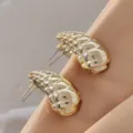 Chunky gold teardrop stud earrings with textured metallic finish, elegant detail shot. - Large Hammered Conch Style (A24-114P 3.3cm)