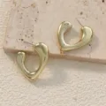 Gold metal abstract heart hoop earrings detailed close-up shot for women fashion daily wear - Abstract Heart C-Shaped Style (A24-049P) / Gold