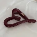 Matte burgundy heart-shaped hair claw clip with elegant gold typography for thick hair styling. - Heart Gold-Labeled Hair Claw / Red