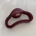 Matte burgundy hair claw detail shot, large cloud design for thick hair styling accessories. - Hollow-Out Gold-Labeled Hair Claw / Red