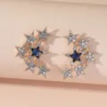 Elegante goldene Stern-Ohrringe mit blauem Kristall und funkelnden Strasssteinen für Damen. - Gold Sternhaufen Stil (A23-237)
