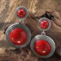 Closeup detail view of vintage bohemian round red stone dangle earrings with silver rope finish. - Double Round Red Stone Style (A23-730A)