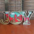 Panneau de Noël en bois 3D JOY, décoration de vacances multicouche pour table de maison. - Signe JOY
