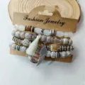 Boho multi-layer beaded bracelet set with tassel and wing charm for women vintage chic. - Regular Style (B23-434)