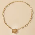 Gold paperclip chain necklace with cute flower toggle clasp, stylish minimalist jewelry piece. - Gold Paperclip Chain Flower OT Clasp Necklace (AMY340 Gold)